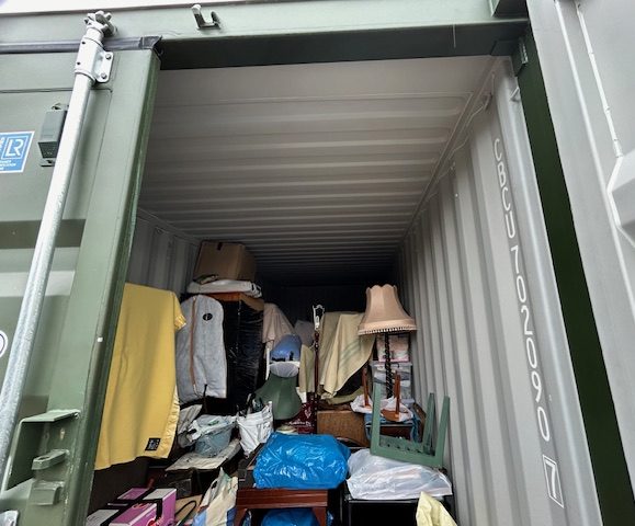 a storage unit full of furniture