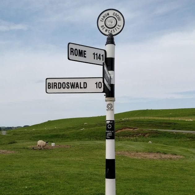 A Sign Post with Birdoswald and Rome in Cumbria, UK