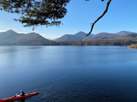 Cumbria Lake view with mountains in background and canoe in foreground