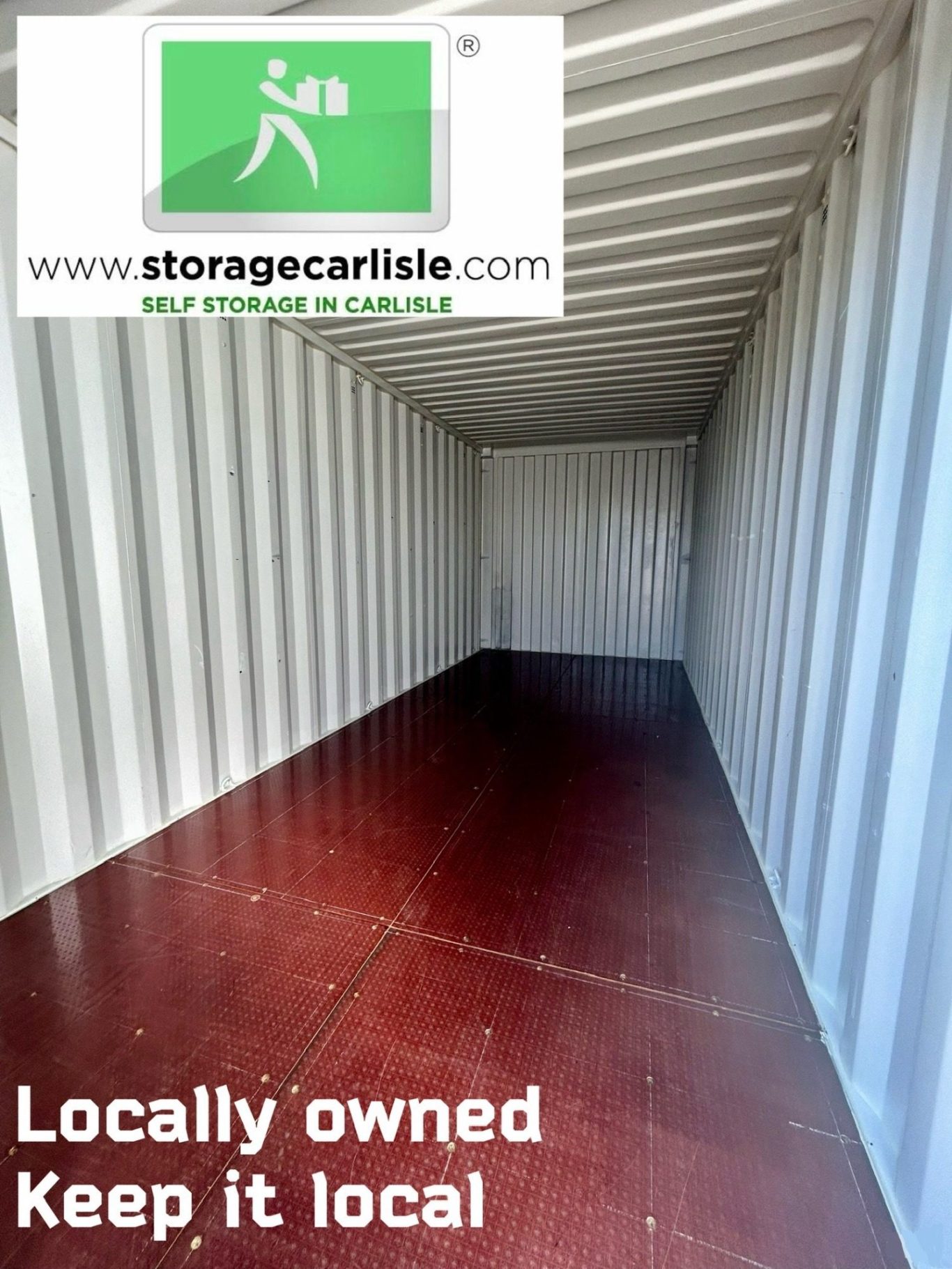 the interior of a shipping container with Storage Carlisle logo