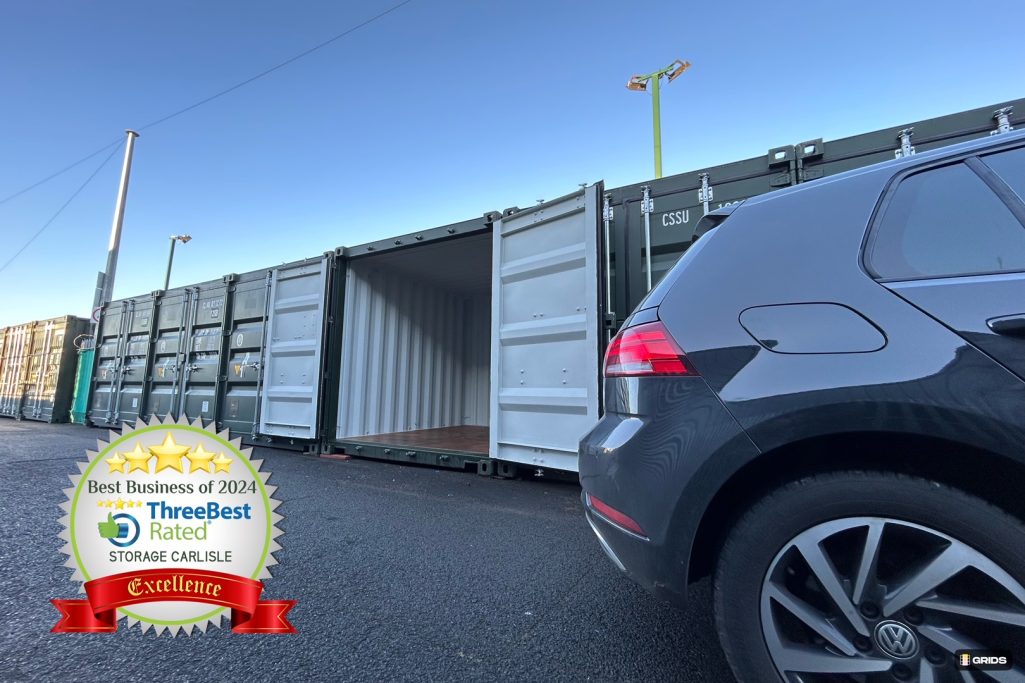 car unloading at a row of shipping containers