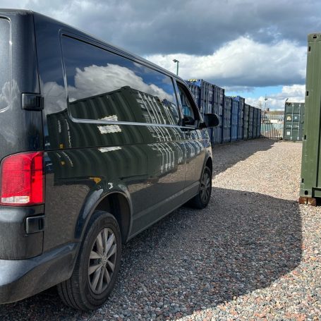 a van driving onto a self storage facility